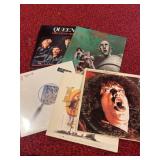 Five vinyl albums including queen, Chicago, and