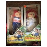 Raggedy Andy and Ann in boxes