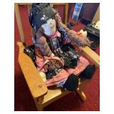 Small wooden rocking chair with handmade girl