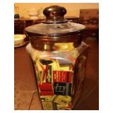 Match books in large glass jar