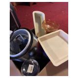 Kitchen items, including countertop, deep fryer,