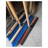 3 Pushbrooms and a squeegee