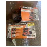 Two Black & Decker quarter sheet finishing