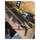 Collection of pry bars and hand saws