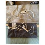 Weighted Sharper Image Heating Pad and a regular