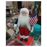 Amerucan Santa 19' tall holding Nutcracker