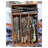 Group of collectible knives, center group has