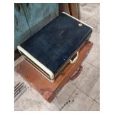 2 suite cases, navy & brown 21'W & 26'W