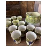 NB porcelain pitcher and 6 cups and 6 Limoges
