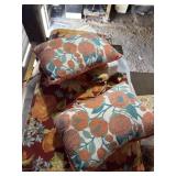 One outdoor cushion set and two decorative
