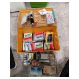 Brown sewing case with contents