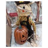 Tall pumpkin & large scarecrow
