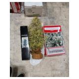 2 Trees & flocked Garland 9'.