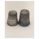 2  silver thimbles marked Sterling.    .370oz