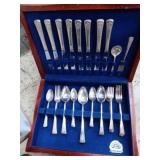 Flatware in wooden storage box