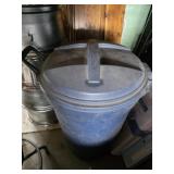 Rubbermaid trash can and selection of wood pieces