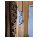 Assorted lumber in corner