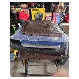 6 Various sizes and colors of tarps