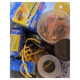 Bungee straps, mosquito coils, tape and bins full