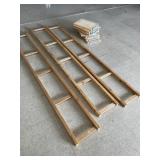 Multitiered adjustable wooden shelving unit. It