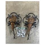 Gothic-style wrought iron wall sconces, cone