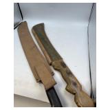 2 Machetes one with woodcase and one with leather