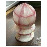 Carved pink and white marbled stone piece,