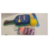 Dog toy and doggie poop bags