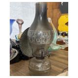 Glass oil lamp with reflector