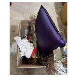 Random assortment hats, purple pillow,