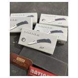 Five flying falcon pocket knives and three