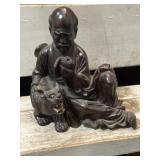 10-11' hand-carved Asian sculpture