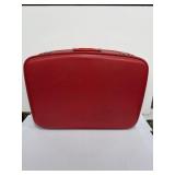 red hard-case cosmetic or student travel case