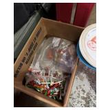 Multi colored wooden golf tees, gold ball and