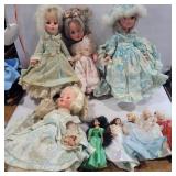 4 furga dolls and small disney/barbie dolls some