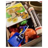 Wooden puzzle, plastic toys, and tootsie roll