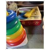 Fisher-Price Rock-A-Stack stacking ring toy and a