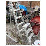 Two aluminum step ladders one is 3 foot and one