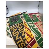 Collection of eight football pendants