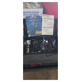 Metal tool box with automotive testing equipment