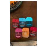 6 touchland type hand sanitizer sprays.