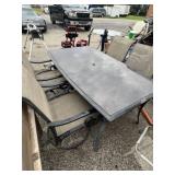 black metal outdoor patio dining set with a