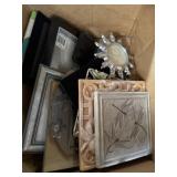 Mix of photo frames and wall art