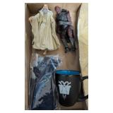 Action figures, gloves, coffee mug