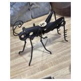 handcrafted metal grasshopper sculpture 7x5'
