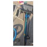 Brooms snow shovel and footstool