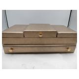 Golden jewelry box with accessories