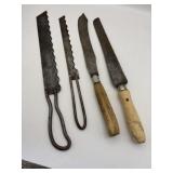 Two metal bread knives, 12 inch and 14 inch