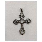 Silver cross pendant marked 925 .205oz