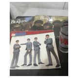 Three Beatles calendars and Beatles drinking glass